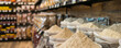 © Volodymyr - A gluten-free baking section in a grocery store, featuring flours, mixes, and baking essentials.