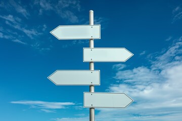 Wall Mural - An image of four blank white road signs pointing in different directions against a background of a bright blue sky with scattered clouds.