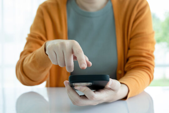 Young woman using smartphone.