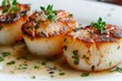 © Popelniushka - Fried Scallop Delight: Seared Scallops with Herb Infused Sauce at a Luxury Eatery