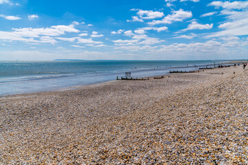 Wall Mural - A view out to sea from the beach at Pagham, Sussex in summertime