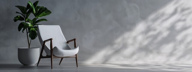 Sticker -  A white chair next to a potted plant on a hardwood floor, facing a gray wall