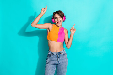 Sticker - Photo of pretty carefree woman wear pink orange top singing enjoying music headphones dancing isolated teal color background