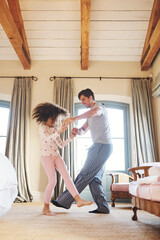 Poster - Dad, kid and morning dancing in home for carefree, happy growth or child development on weekend. Smile, father and daughter in bedroom together with music, energy and fun with bonding connection