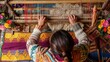 © Darcraft - A traditional weaver working on an old-fashioned loom, creating a colorful textile with intricate patterns.