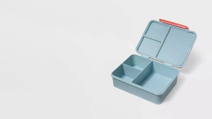 Closeup of small bento lunchbox isolated on copy-space background.