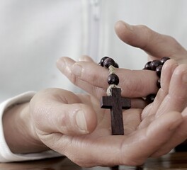 praying to god with hands together  praying with black background with people stock image stock photo