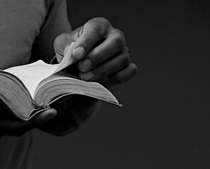 praying to god with hands together on black background with people stock image stock photo	