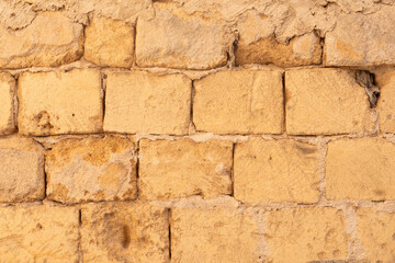Poster - A close up of an aged stone wall