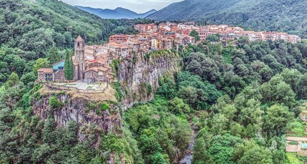 Panoramic drone picture of the historic town of Castellfollit de la Roca in Catalonia in the morning light