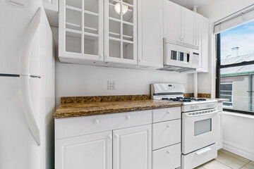 Images of Kitchen with cabinets island appliances cooking and baking