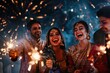 © Pelayo - Friends celebrating Diwali with sparklers at night