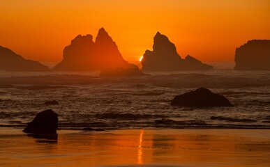 Wall Mural - Silhouettes of Sea Stacks at sunset on the southern Oregon coast at Bandon.