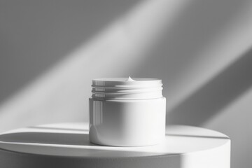 Aufkleber - A white container sitting on a table