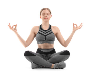 Wall Mural - Sporty young woman meditating on white background. Balance concept