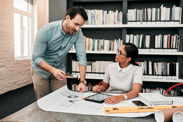 Canvas Print - Man, woman and tablet with design for architecture with review, talk and floor plan for property in office. People, partner and notes for blueprint, feedback and smile with planning for construction