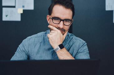 Canvas Print - Laptop, thinking and architect in office for building project, planning and design research. Computer, man and young engineer in workplace for contractor, development and industrial blueprint