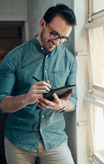 Leinwandbilder - Planning, smile and tablet with graphic designer man at window in office for creative occupation. Business, technology and web developer with happy person in workplace for online project research