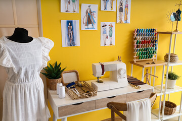 Sticker - Interior of atelier with tailor's workplace, mannequin and sketches