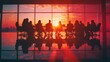 © Tida - Silhouettes of a diverse group of business people, seated in a meeting room with a stunning sunset view, symbolizing teamwork, collaboration, success, ambition, and opportunity.