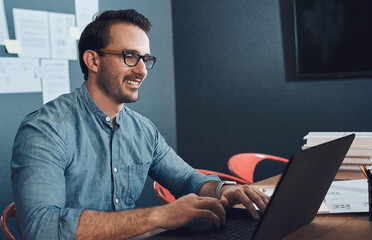 Leinwandbilder - Laptop, architecture and happy man in office for building project, planning and design research. Computer, smile and young engineer in workplace for contractor, development and industrial blueprint