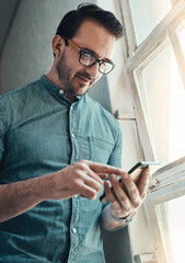 Leinwandbilder - Smartphone, businessman and planning in office for research, thinking and website design. Cellphone, scroll and creative engineer in workplace for digital project, development and startup application
