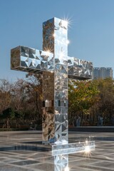 Wall Mural - Wide view of the huge shiny silver Corinthian Cross monument