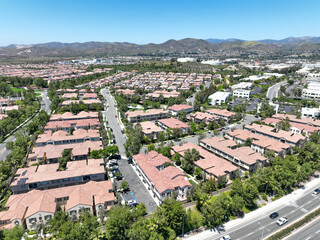 Wall Mural - Aerial view of middle class community identical condominium houses, Lake Forest, South California, USA.