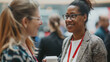 © takayuki - Professional_women_networking_at_a_business_confer
