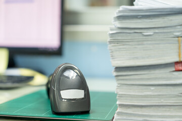 Wall Mural - Stacks of paper, piles of unfinished documents, Business report papers, Using scanner machine for convert document to digital data storing into computer.