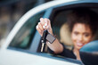 © Chanelle2000/peopleimages.com - Travel, hands and woman with car keys for driving new ride, vehicle ownership and proud of milestone. Girl, automobile purchase and investment for transportation, dealership and rental for journey.