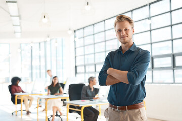 Wall Mural - Design, confidence and portrait of man in coworking space with smile, leadership or pride in office. Happy, face and creative professional with arms crossed in project development at digital agency