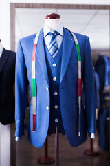 Wall Mural - Jacket with shirt and tie on mannequin