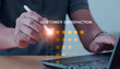 © Alek - Online customer satisfaction ratings Businessman interacts with customer satisfaction rating interface on laptop Choose five stars for high satisfaction. Opinion survey concept, critical star