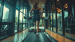 © Chatchanan - Woman running on a treadmill in a modern gym, staying fit and healthy