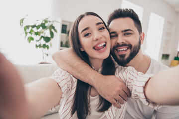 Sticker - Photo of happy young couple move new place enjoy live together take selfie photo have fun new apartment room light house flat indoor