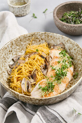 Wall Mural - Gourmet Dish Featuring Egg Pasta with Mushrooms and Grilled Chicken Fillet