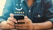 © Stocks Buddy - Man using smartphone with smiley face icon and five starsshowing rating customer satisfaction, positive feedback, digital technology happiness