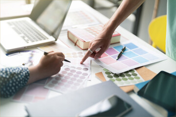 Fototapete - Creative graphic designer team working with color swatch sample, Brainstorming ideas in studio