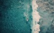© olegganko - Aerial View of Surfer on Wave