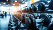 © Hound - Dumbbells and gym equipment in a fitness club or sports center with a blurred background of a modern sports warehouse