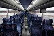 © Mint Images - Interior view of passenger seating in a bus, in rows.
