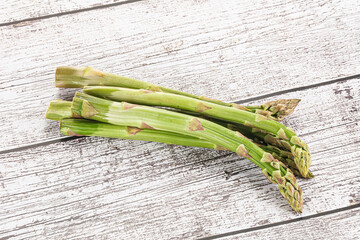 Wall Mural - Fresh green asparagus - vegan cuisine