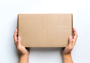 Hands holding a cardboard box against a white background. Perfect for delivery, shipping, and logistics concepts in stock photos.