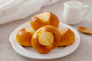 Wall Mural - Pretzel buns on white plate