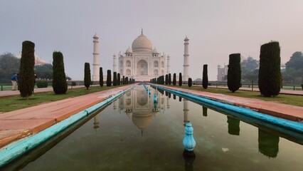 sunrise over the mighty taj mahal one of the seven wonders of the world in agra, india