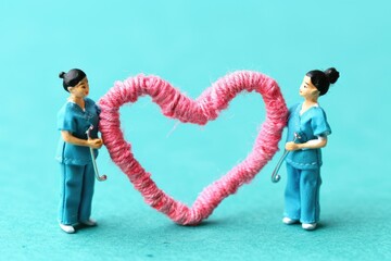 Poster - Miniature doctors diagnose heart shape for treatment.