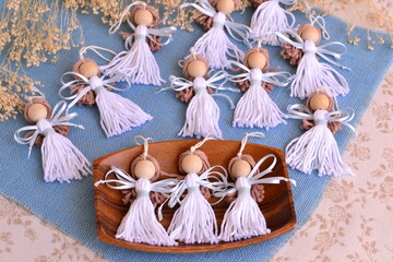 Wall Mural - Baby shower baptism lucky angel doll macrame white blue color guest souvenir, wedding favors, diy project party present, textile cotton fabric small dolls, christmas decoration