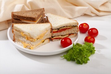 Sticker - Fresh tasty sandwiches with vegetable on wooden chopping board