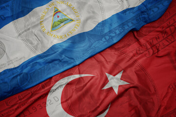 Sticker - waving colorful flag of nicaragua and national flag of turkey on the dollar money background. finance concept.